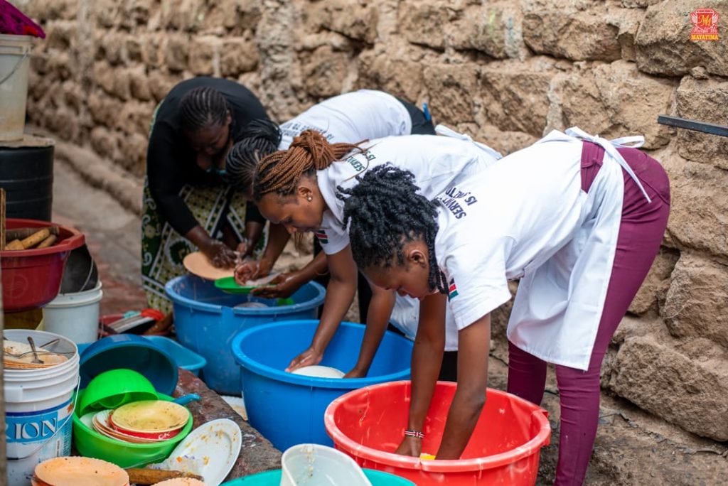 Marafiki members doing cleaning